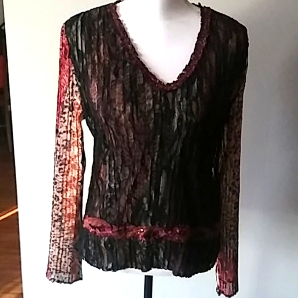 Alberto makali of New York Paris and Milan blouse